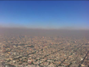 Vue aérienne d’un smog photochimique sur Mexico (2010).